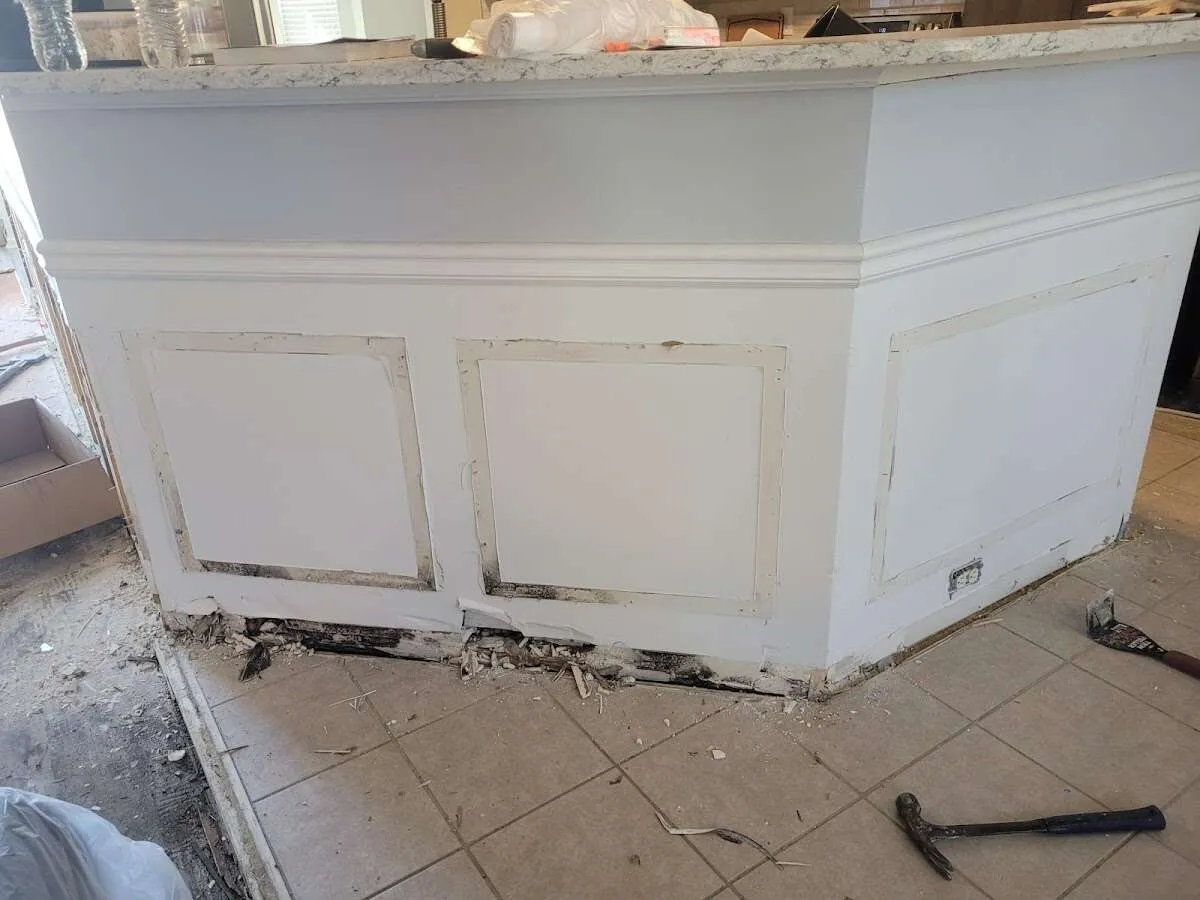 Water damage and mold on kitchen during Storm Damage Restoration in Falls